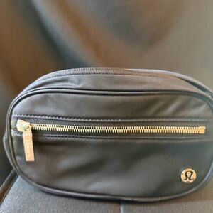 Lululemon Black Bag in black with silver hardware. Gently used. Belt/Crossbody